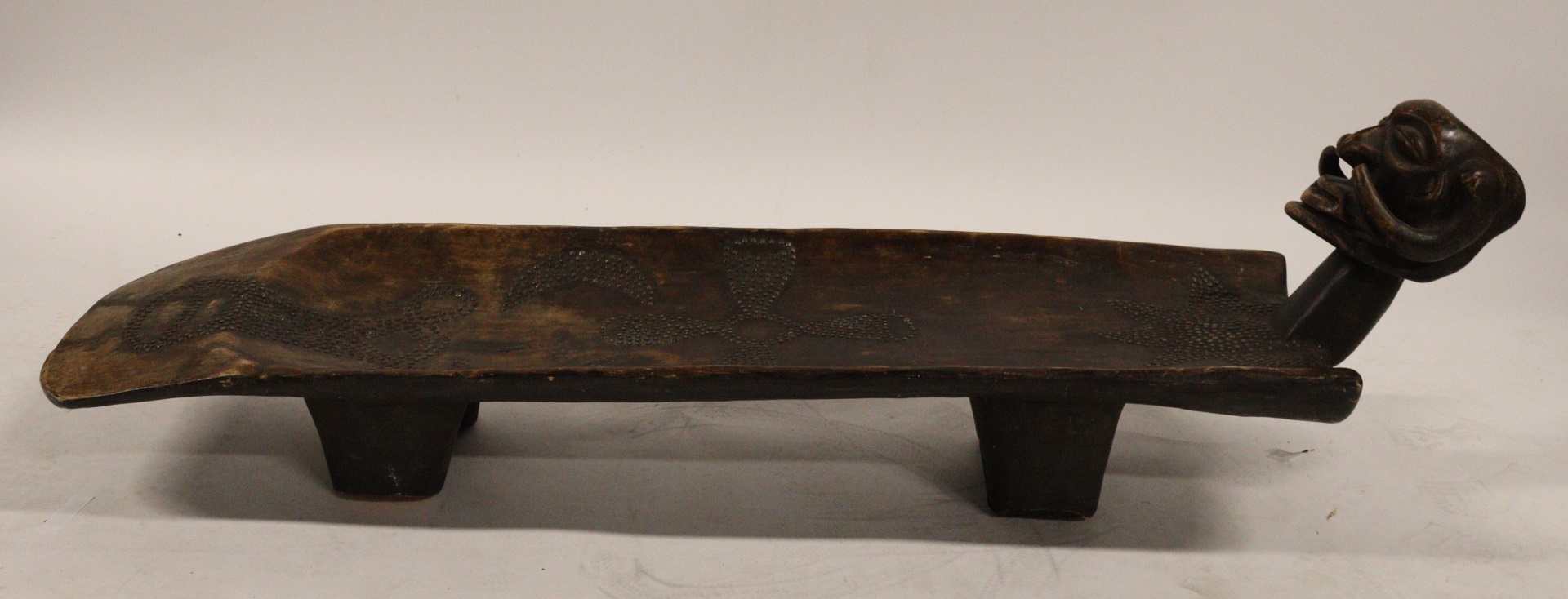 A CARVED AFRICAN CEREMONIAL BED  3b778f