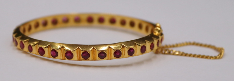 JEWELRY. 18KT GOLD AND RUBY HINGED