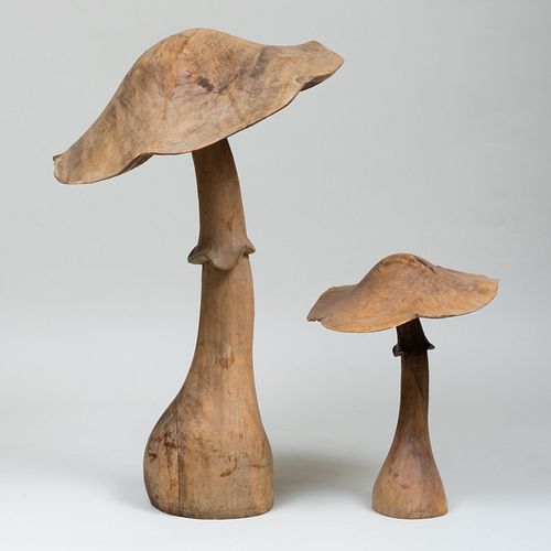 TWO CARVED WOODEN MUSHROOMSThe tallest