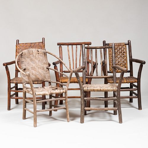 GROUP OF FIVE RUSTIC ARMCHAIRSThe