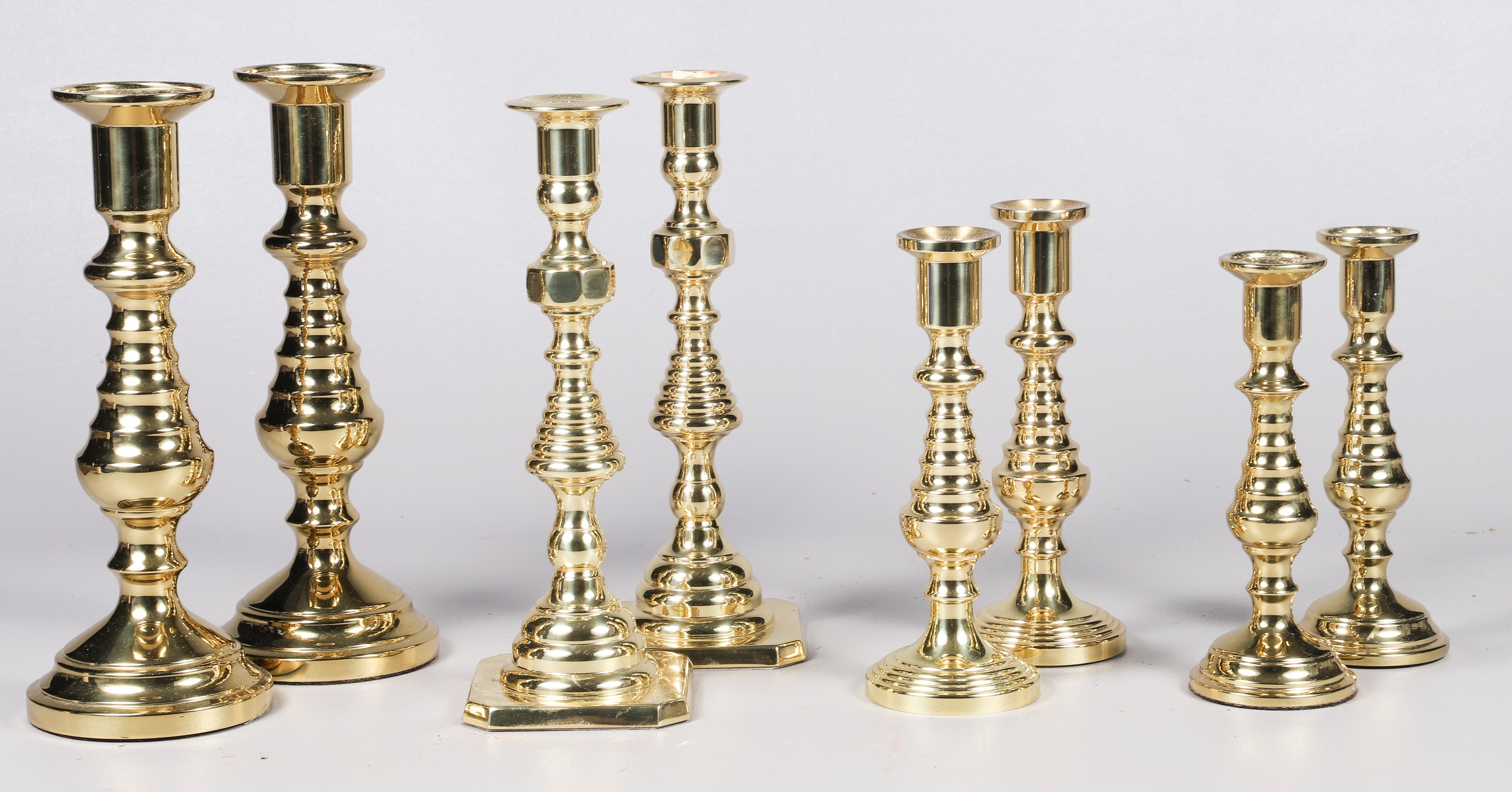 (8) Brass beehive candlesticks,