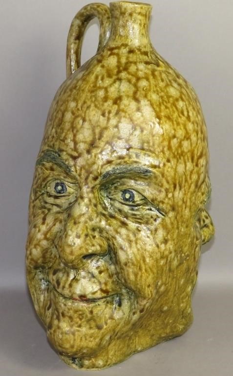 COMICAL TWO-FACE POTTERY JUG BY JAY