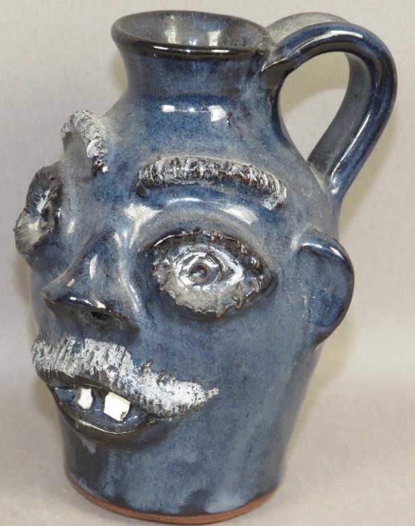 SMALL FOLK ART REDWARE FACE JUG BY STANLEY