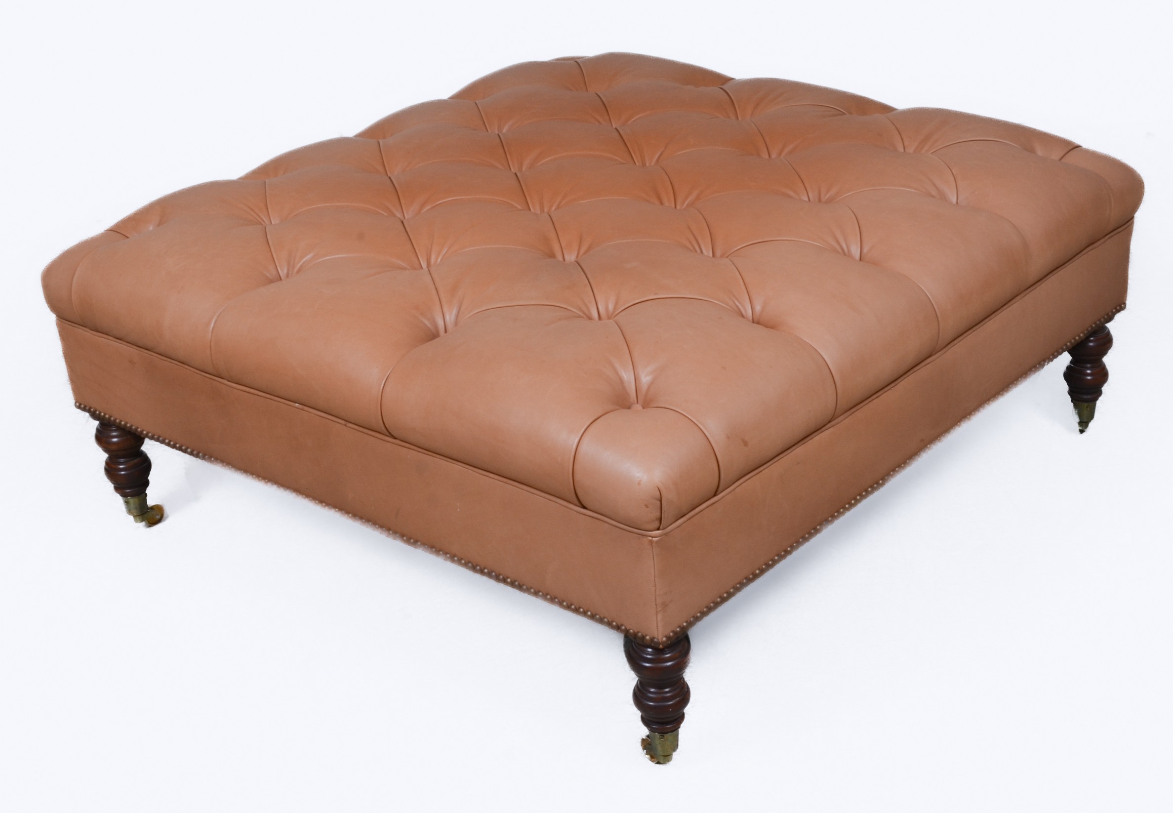 Contemporary tufted leather ottoman,