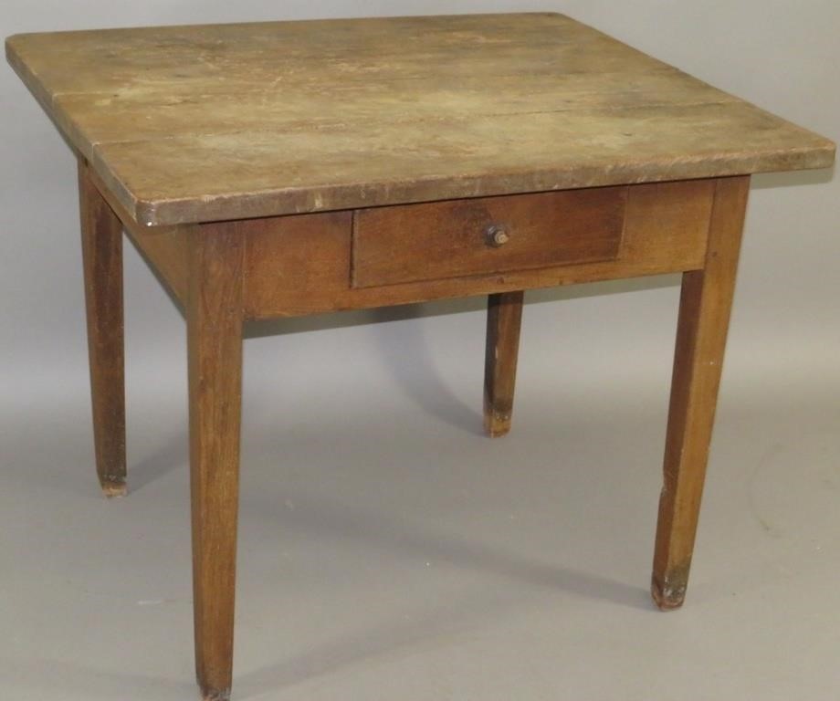 WORK TABLEca. 1830; in walnut,