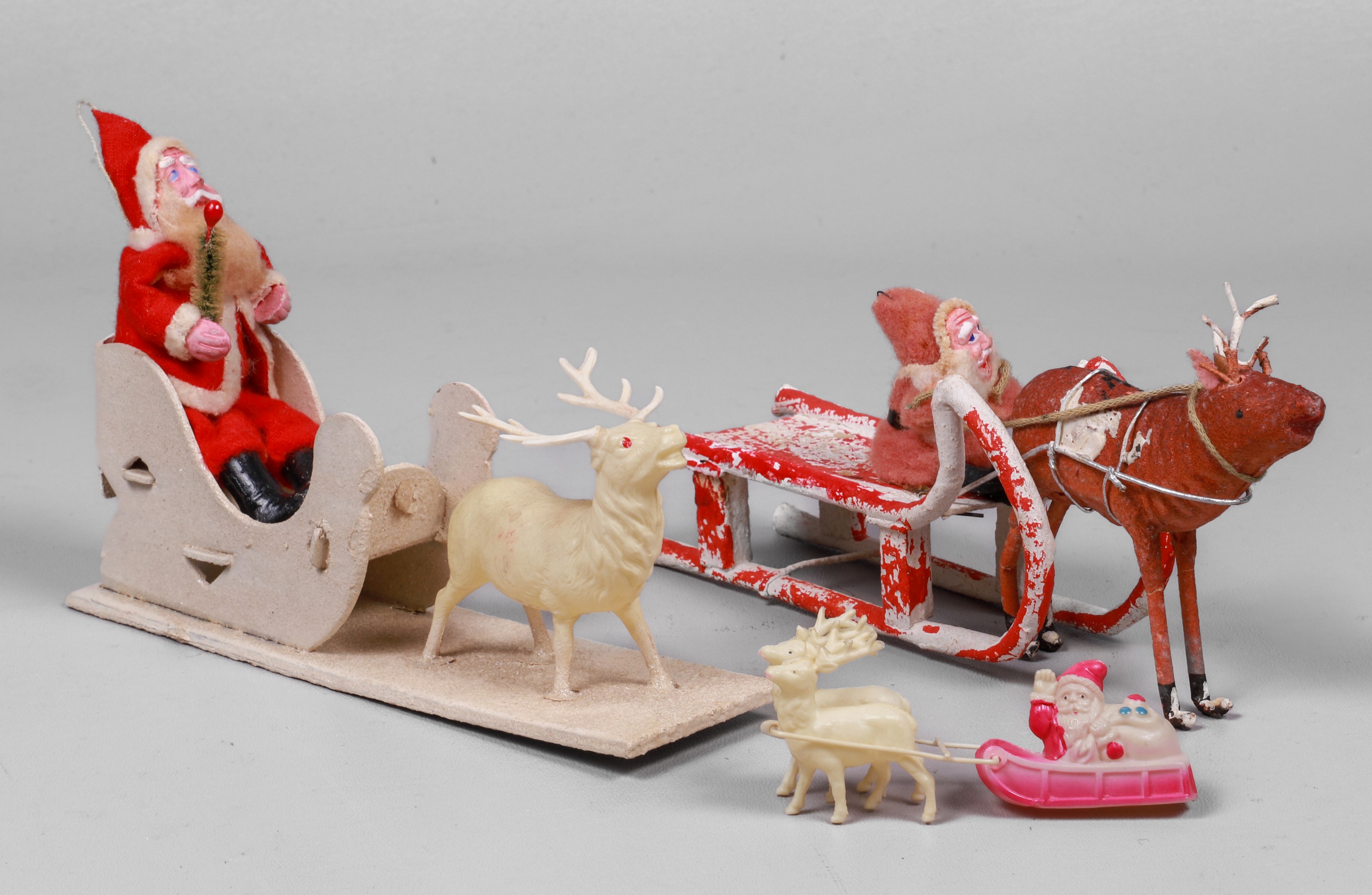 (3) Vintage Santa with sleigh figurines,