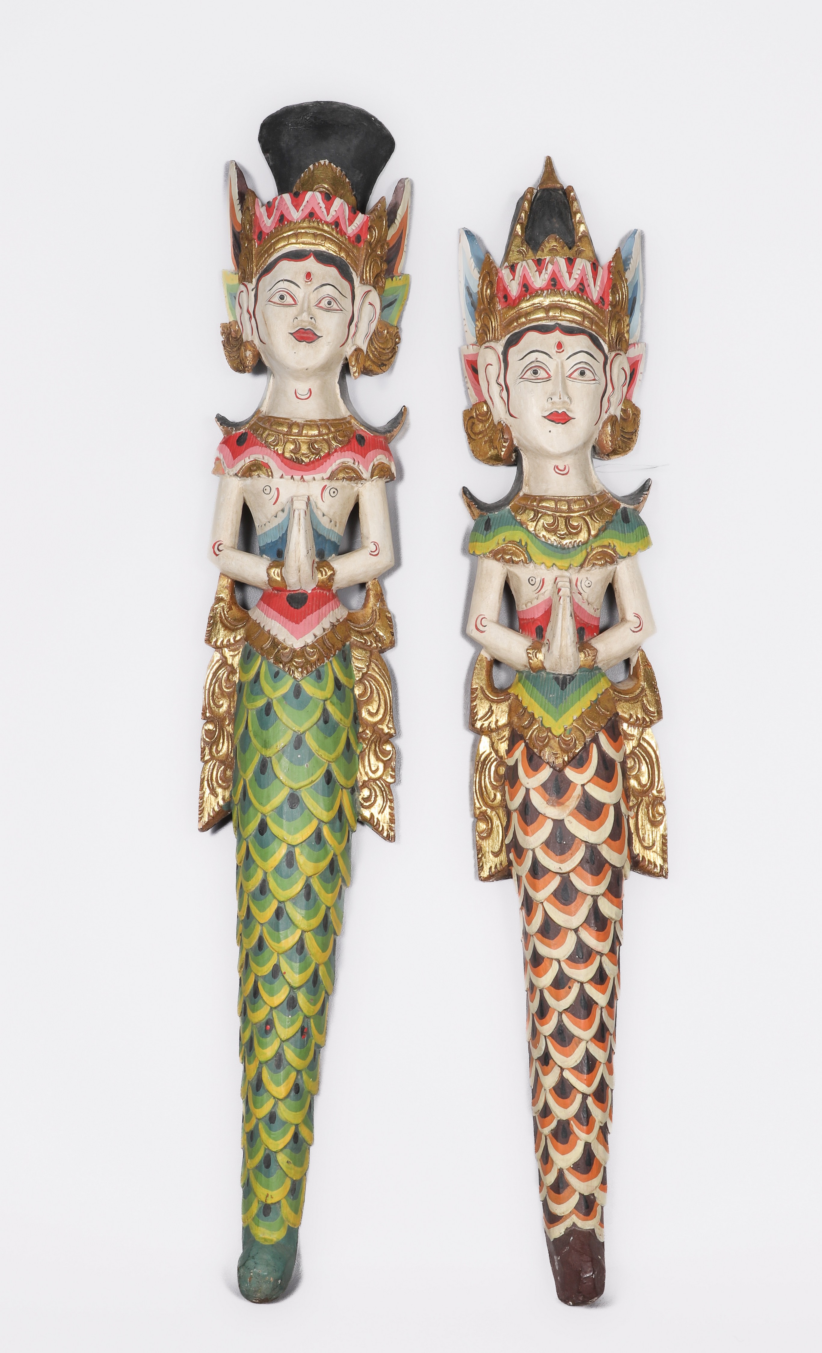 Pair of Indonesian painted carved