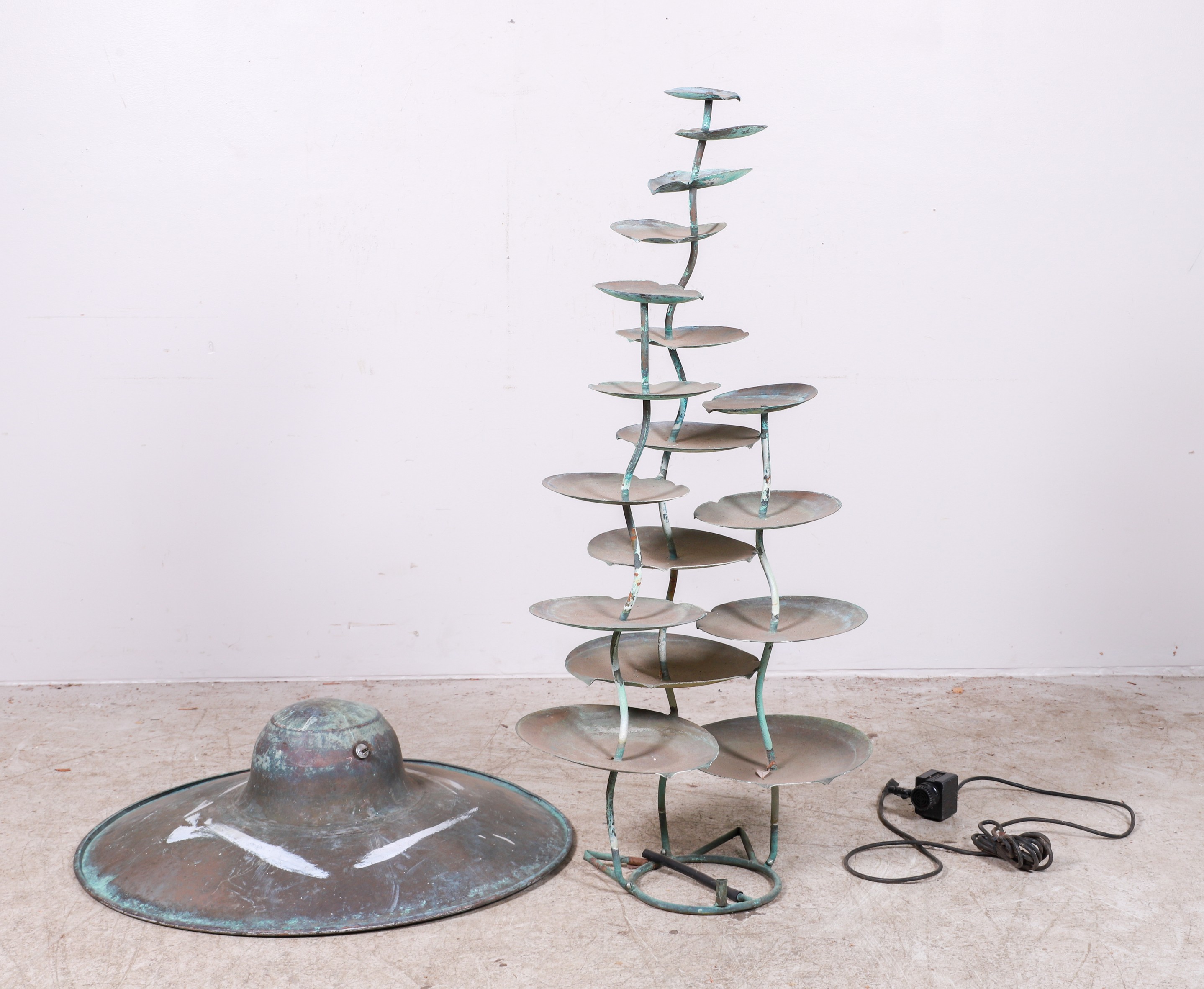 Salterini style tiered lily pad fountain,