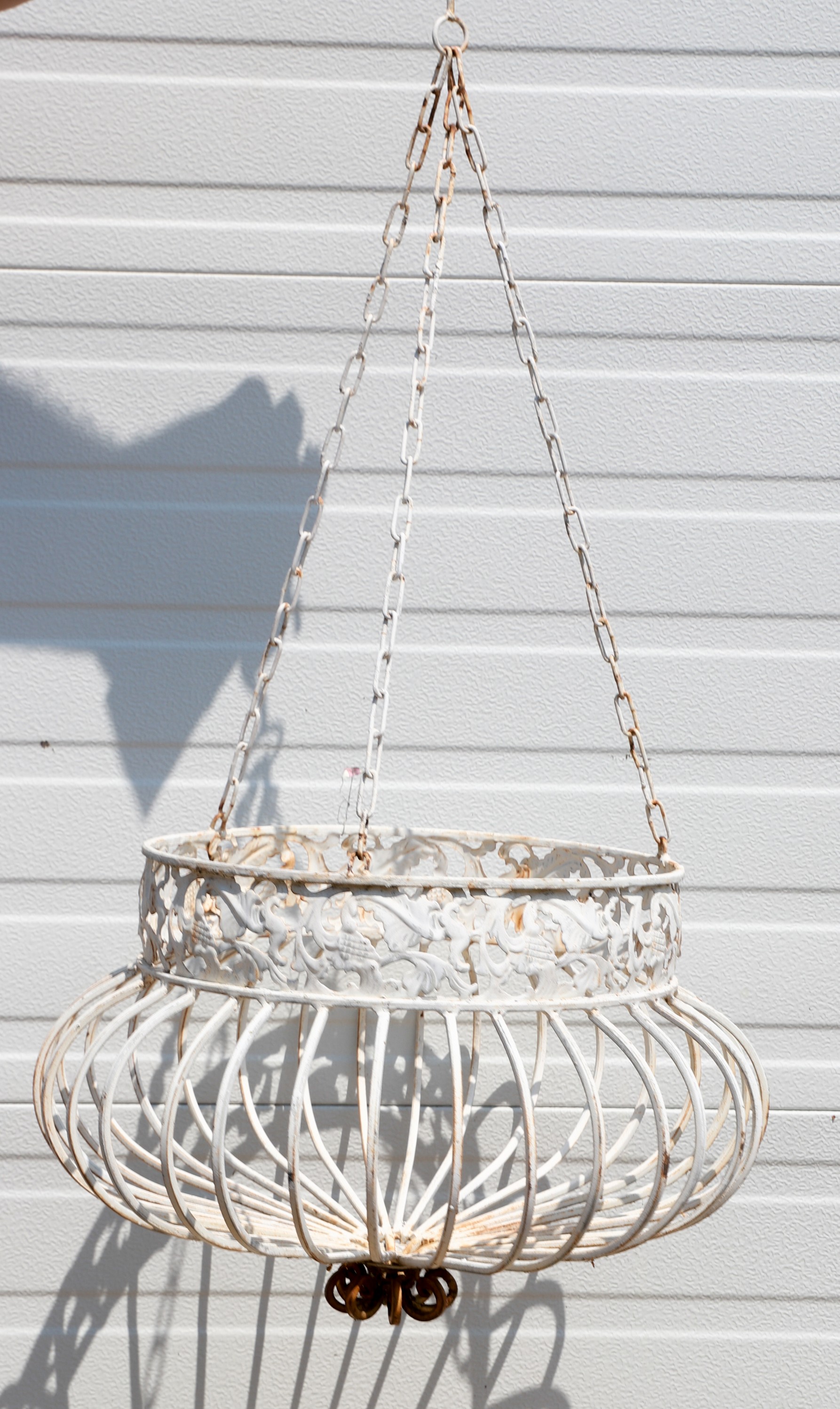 Pierced metal hanging planter,