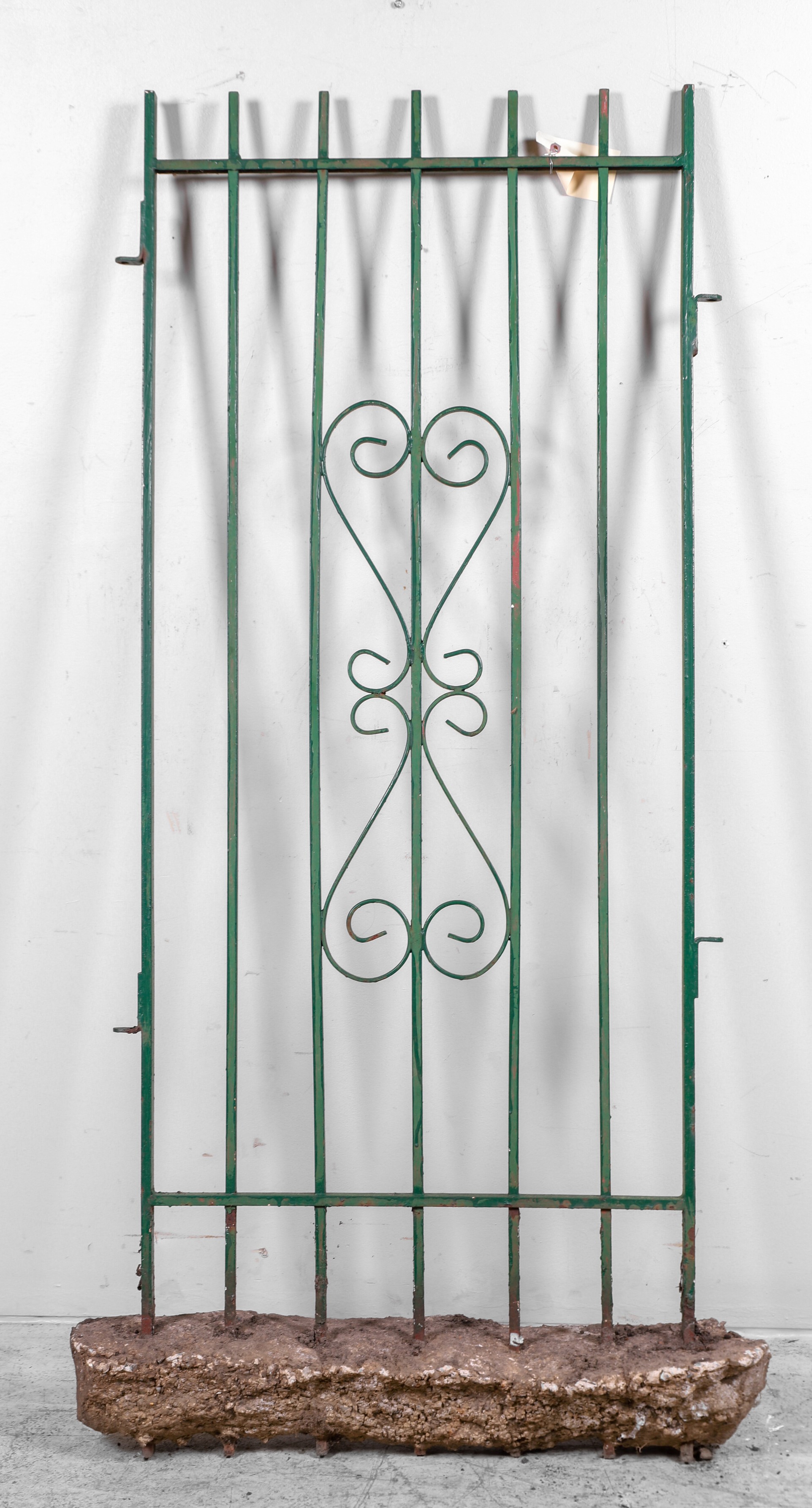 Pierced iron painted fence, green