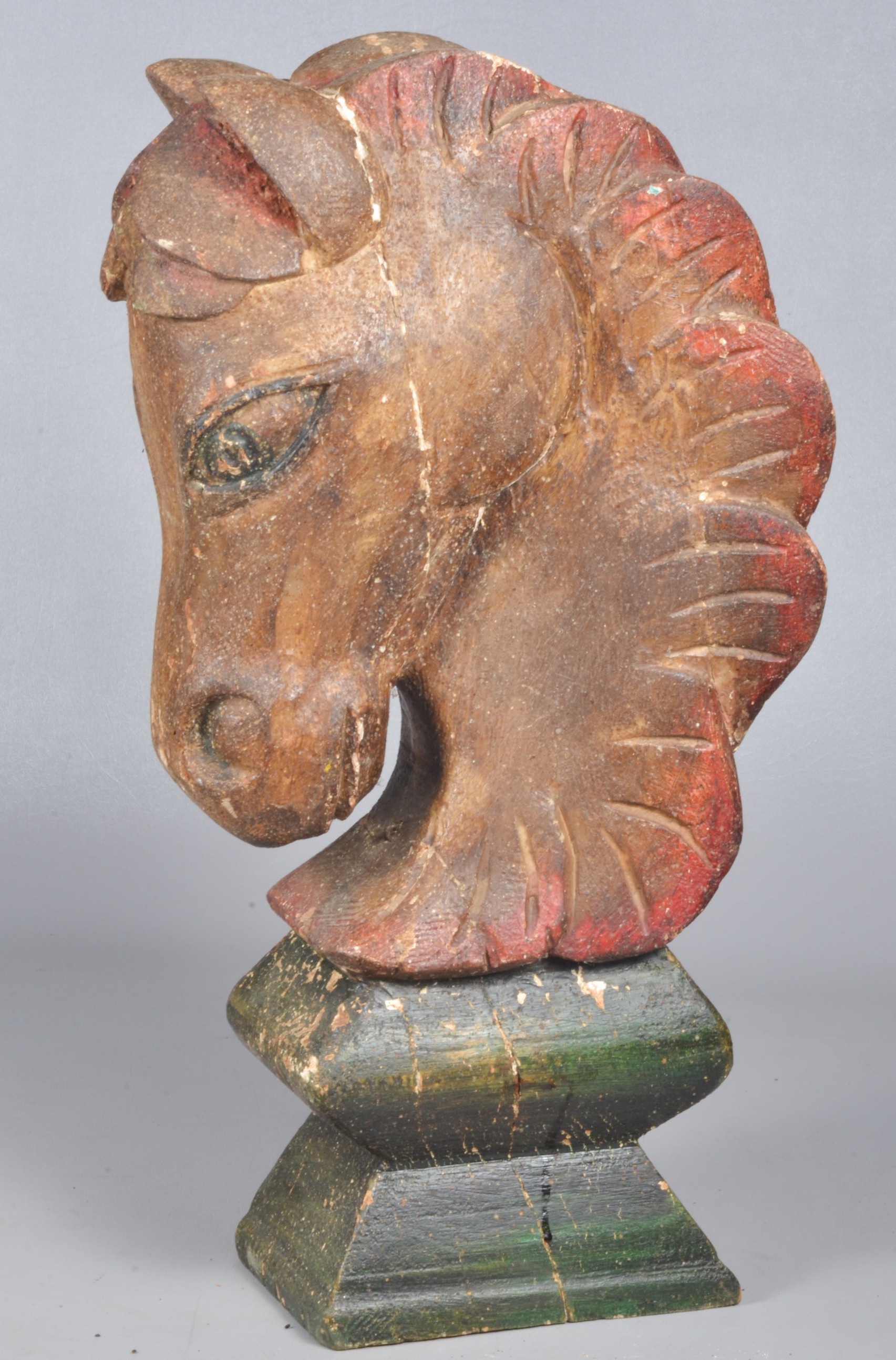 Carved wood horse head sculpture,