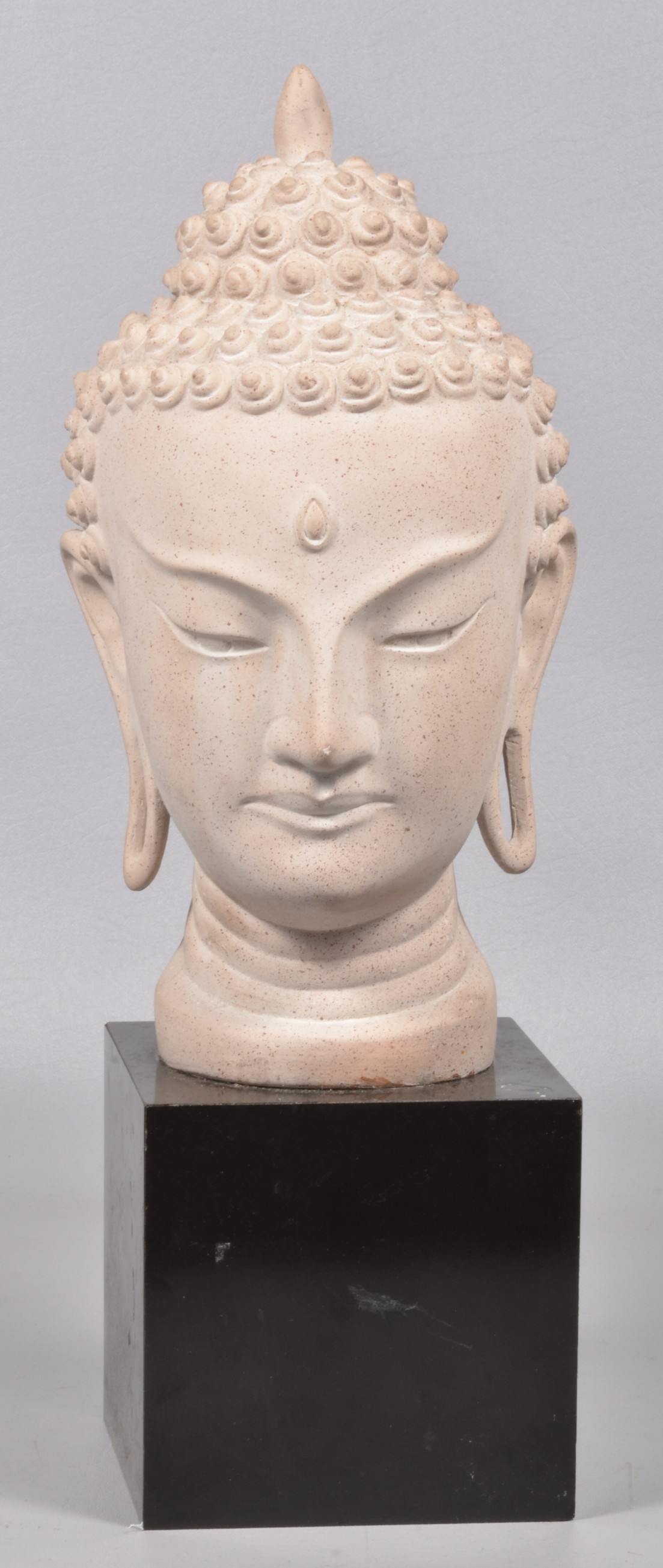 Ceramic bust of Shiva with third