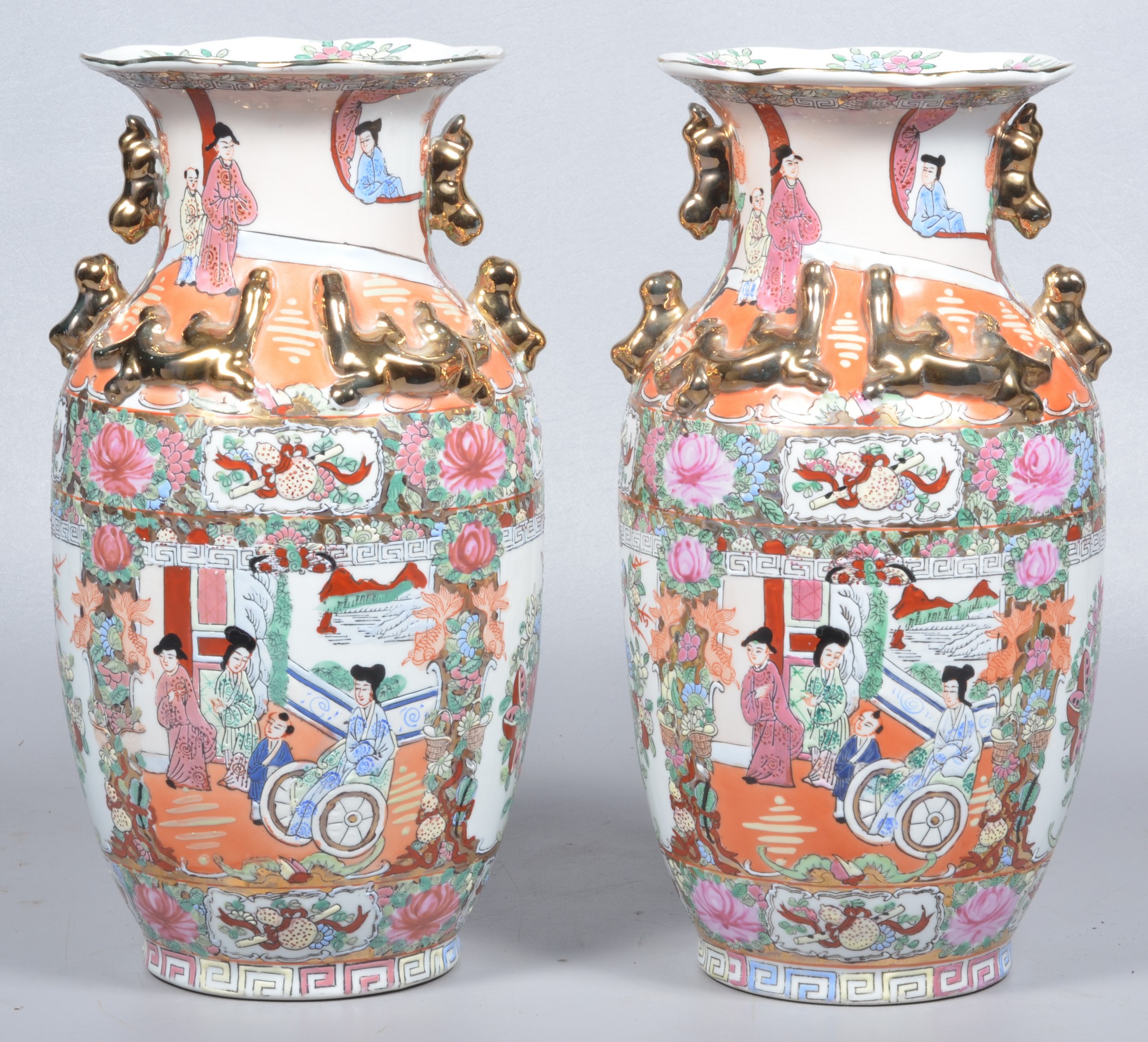 A Chinese famille rose vase pair,