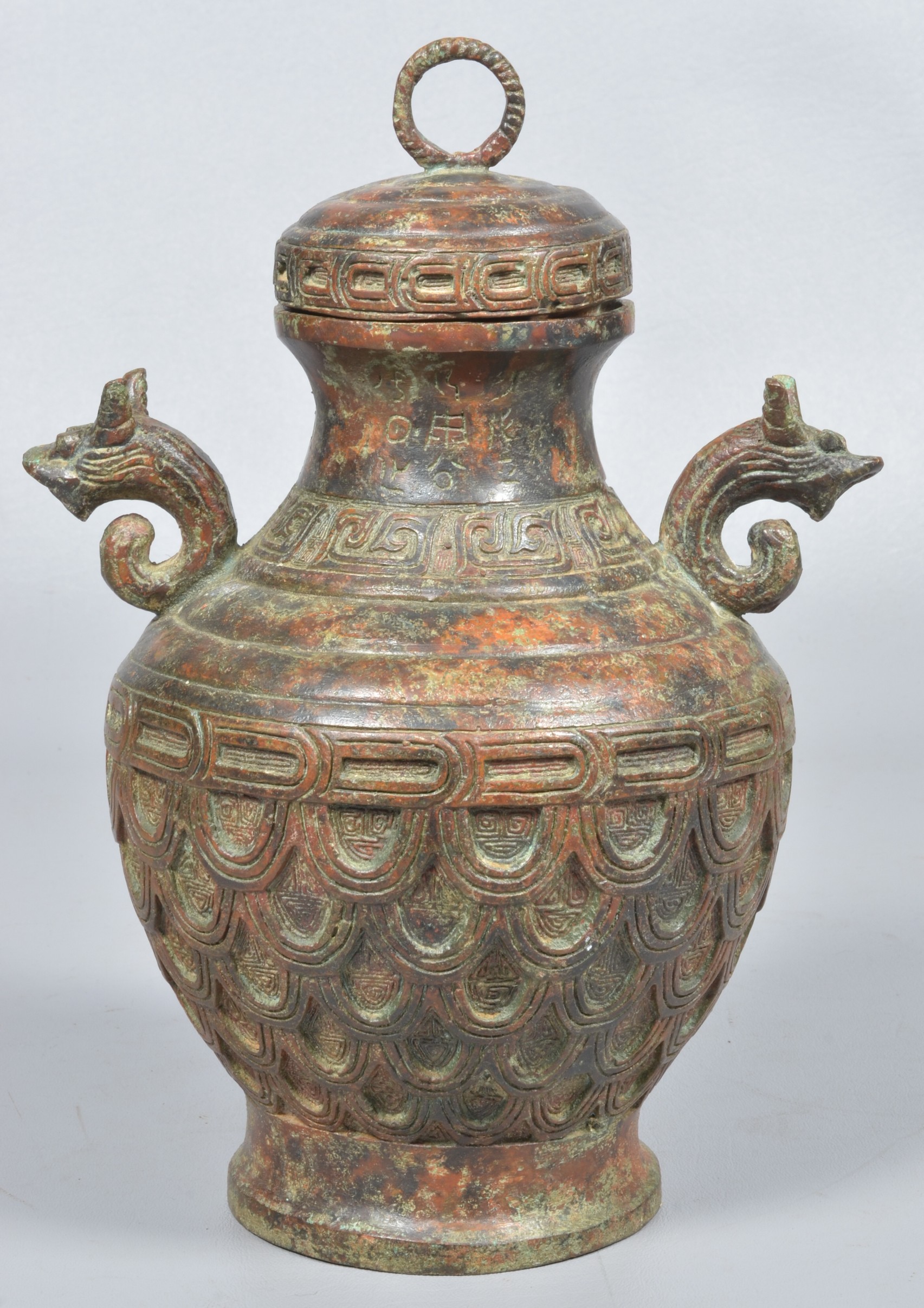 Chinese bronze covered jar, stylized