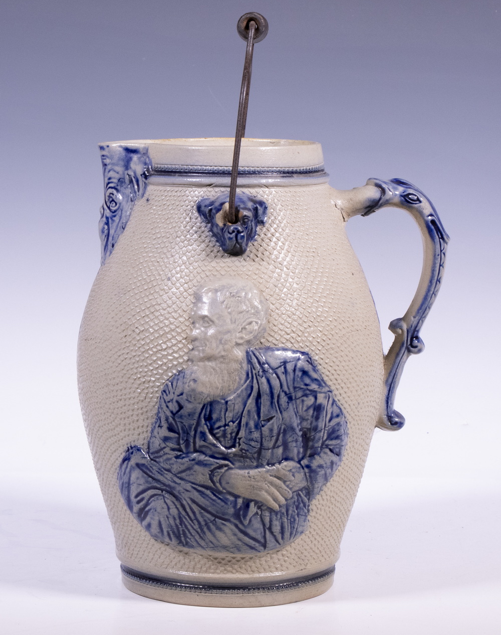 MOLDED STONEWARE PITCHER WITH SWING