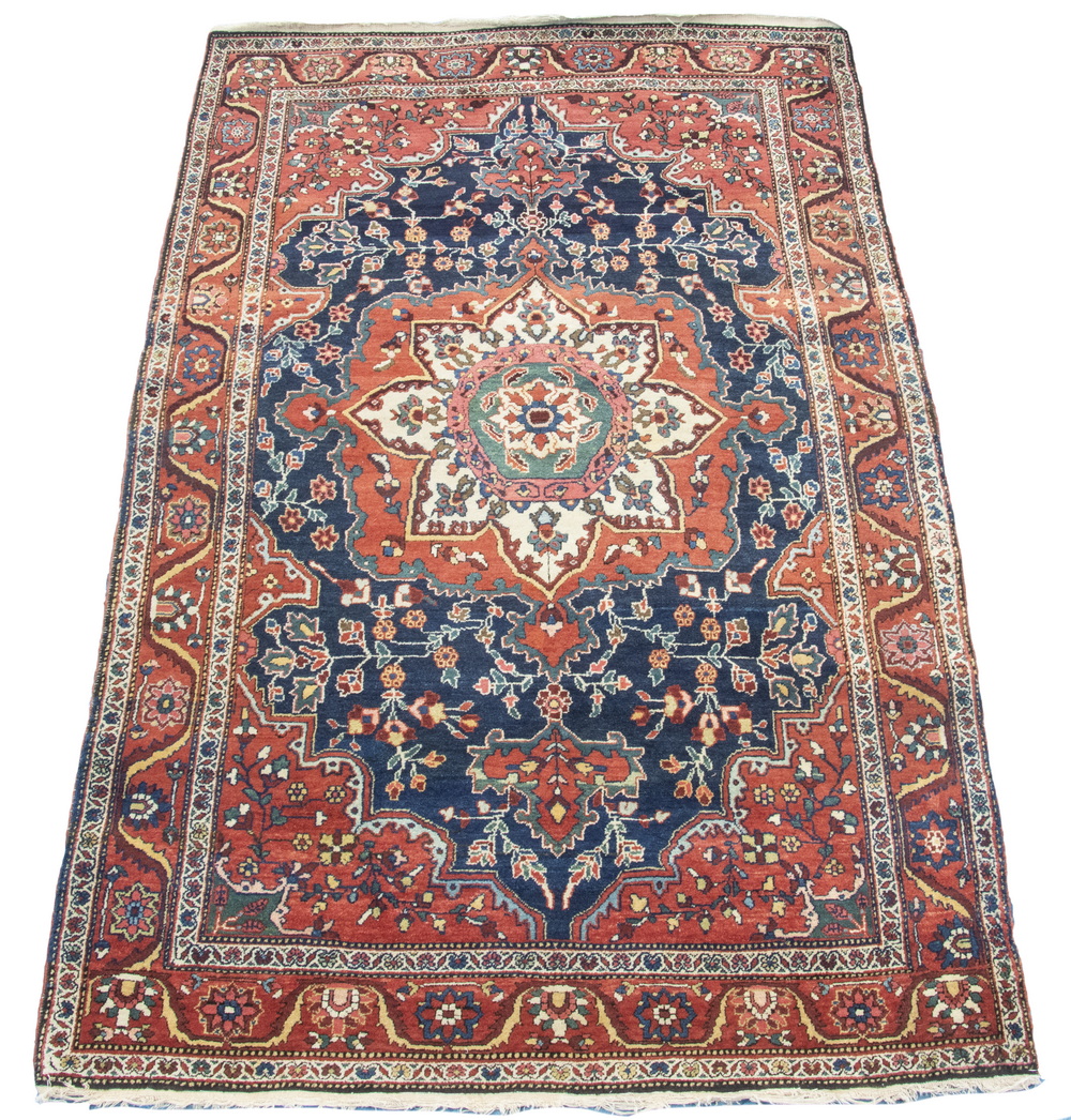 FEREGHAN-SAROUK RUG (4'6" X 6'9")