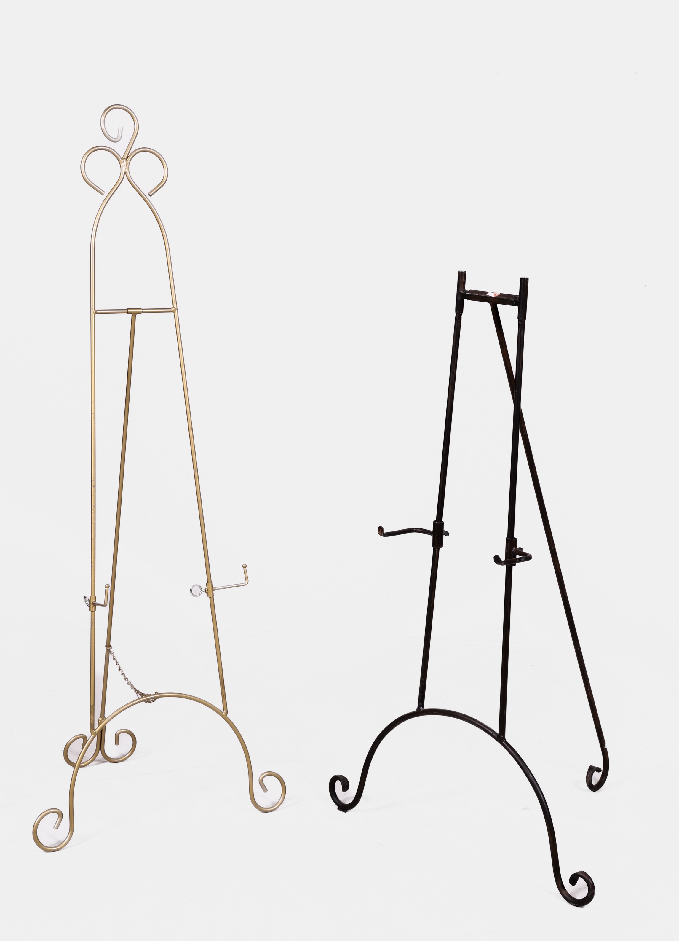 (2) easels, c/o brass painted metal,