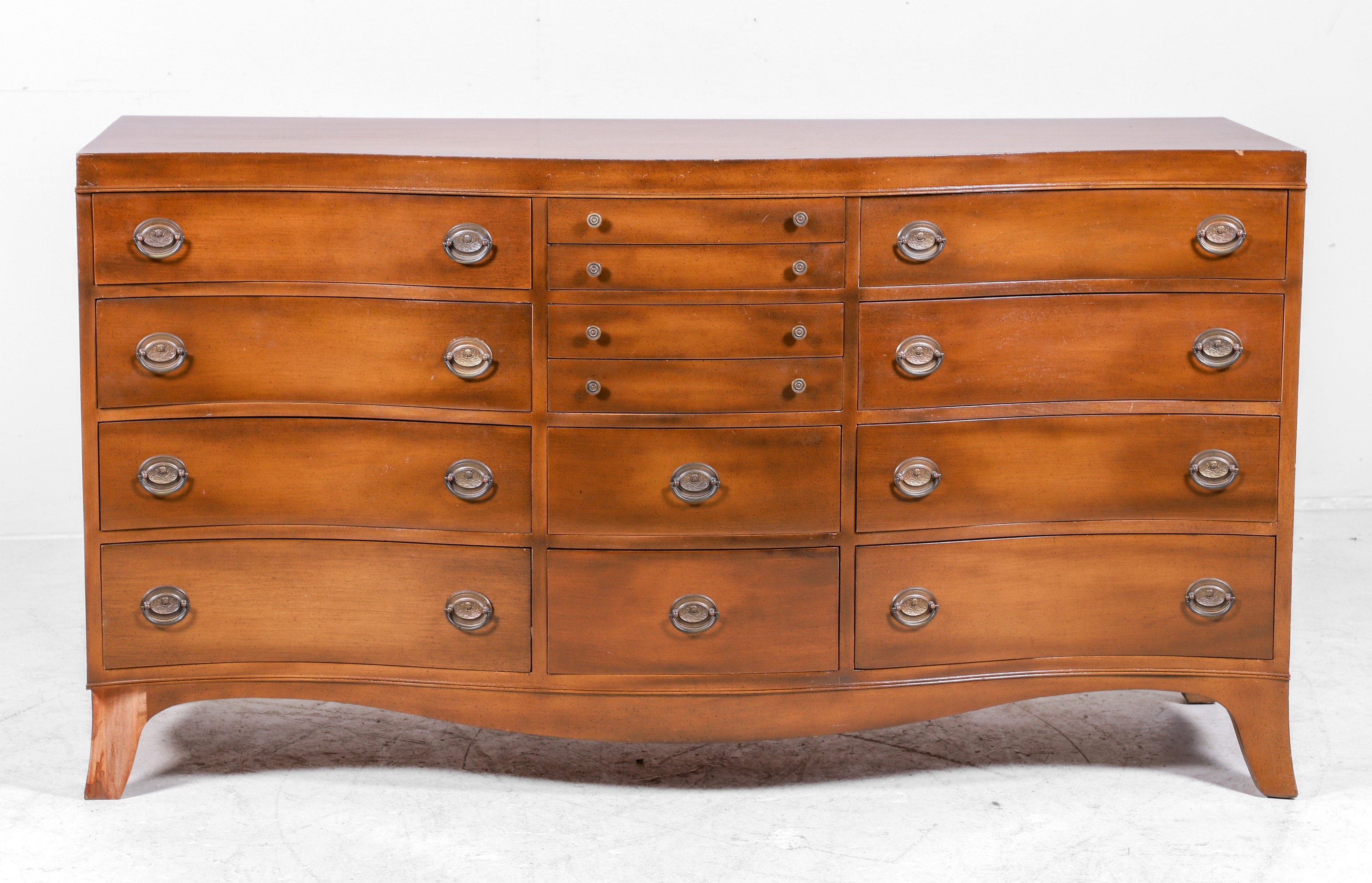 Mahogany serpentine front chest of drawers,