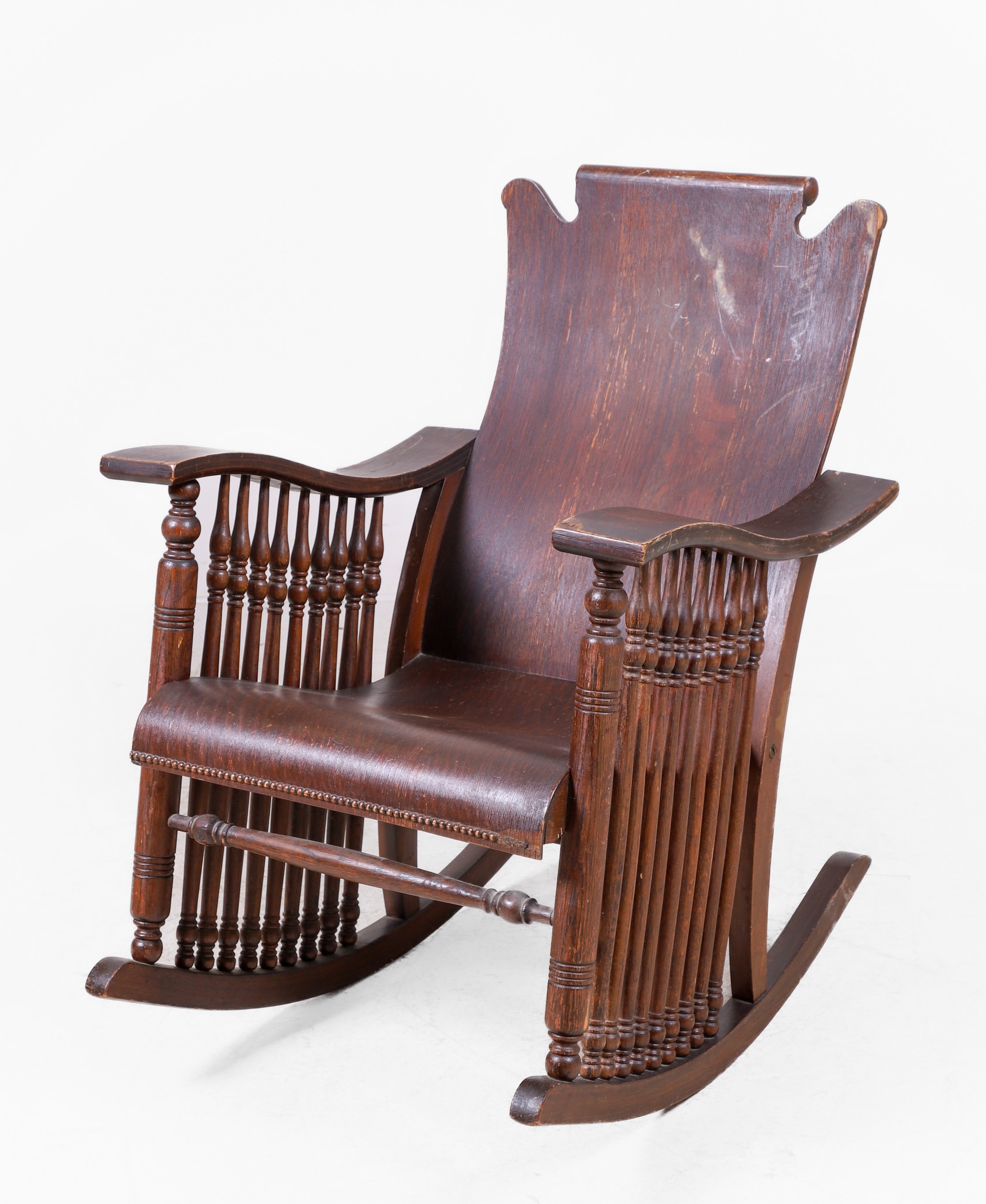 Oak carved rocker, shaped and bentwood