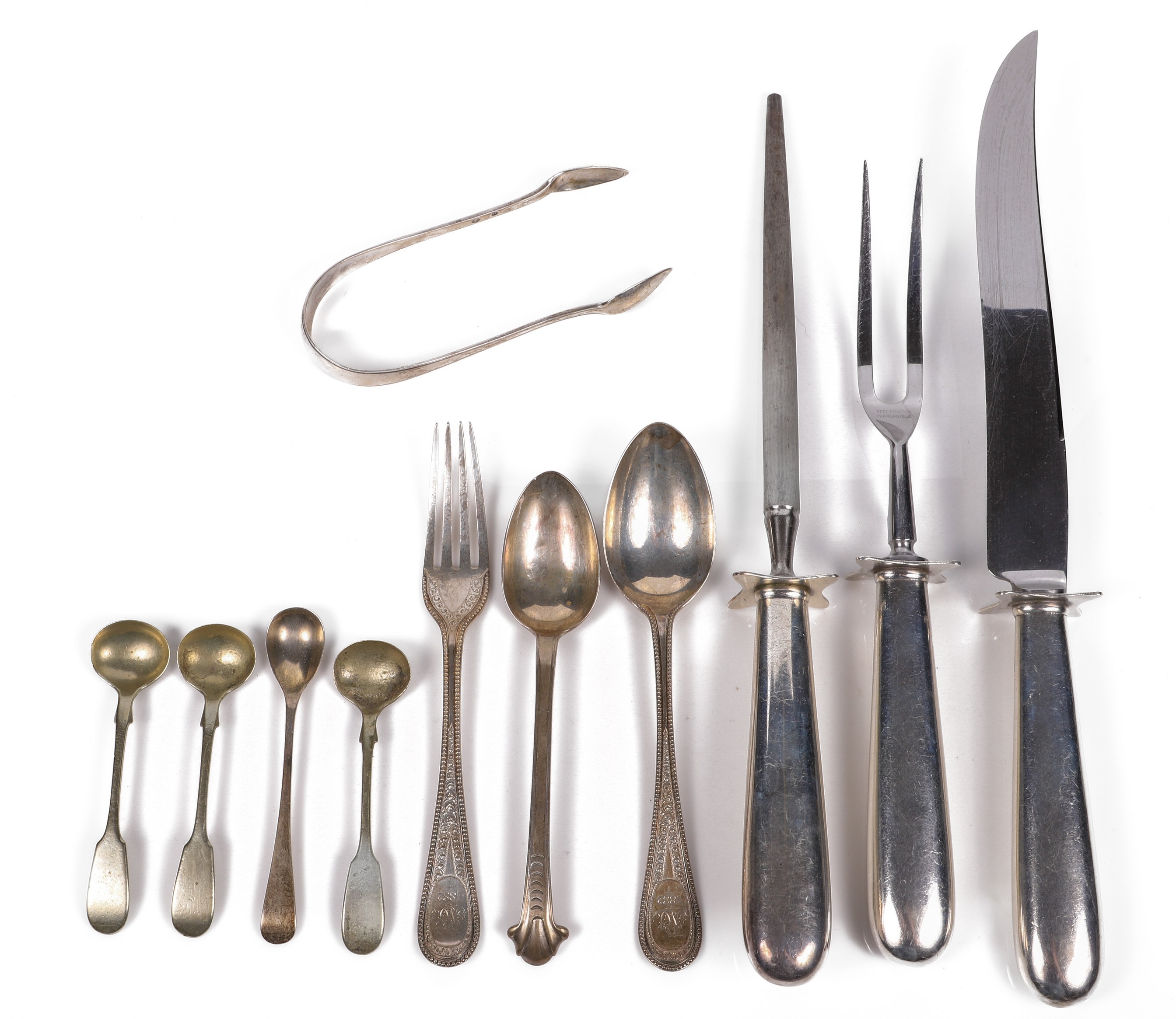 Sterling flatware and carving set