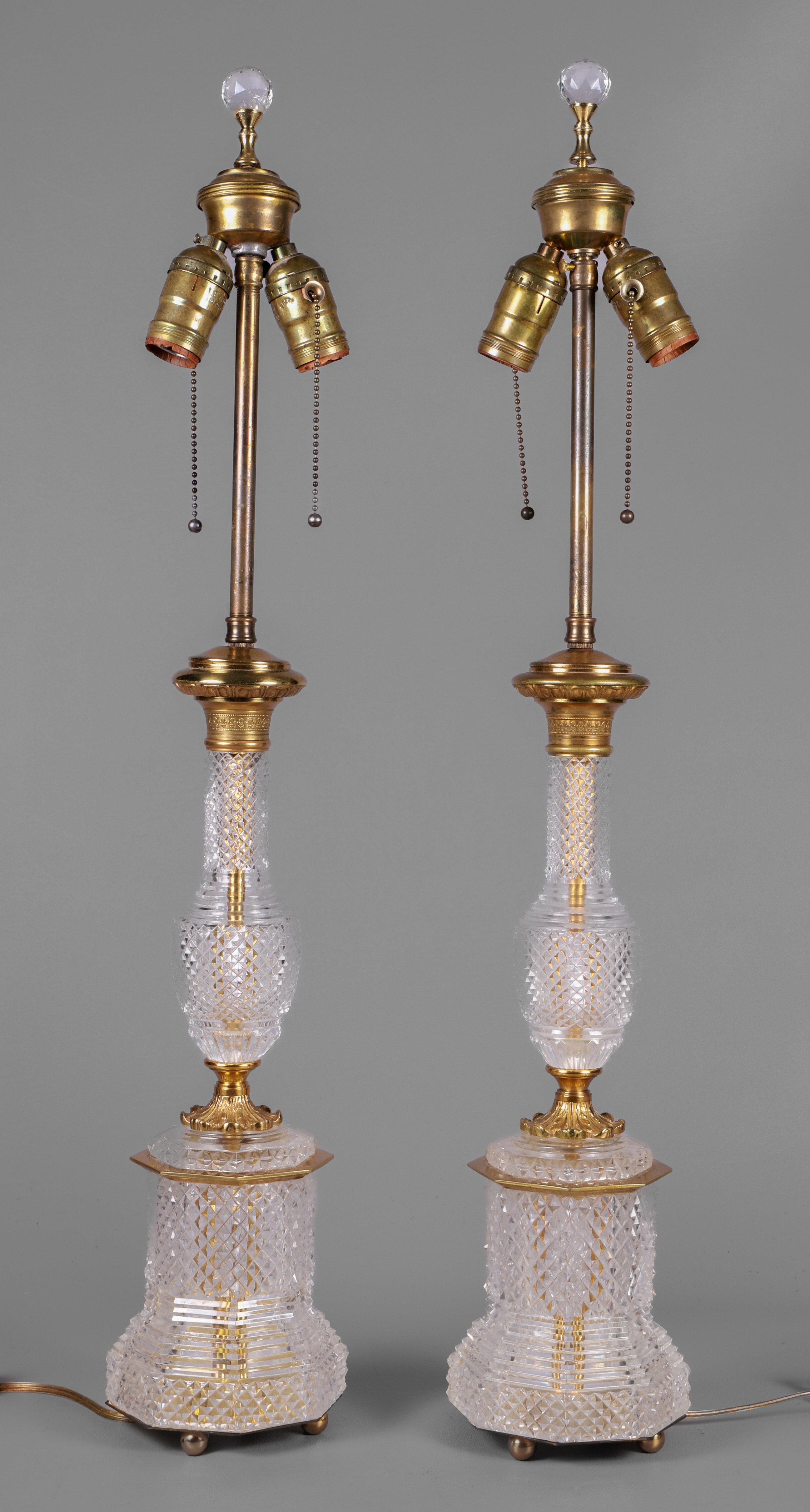 Pair of cut crystal & brass table lamps,