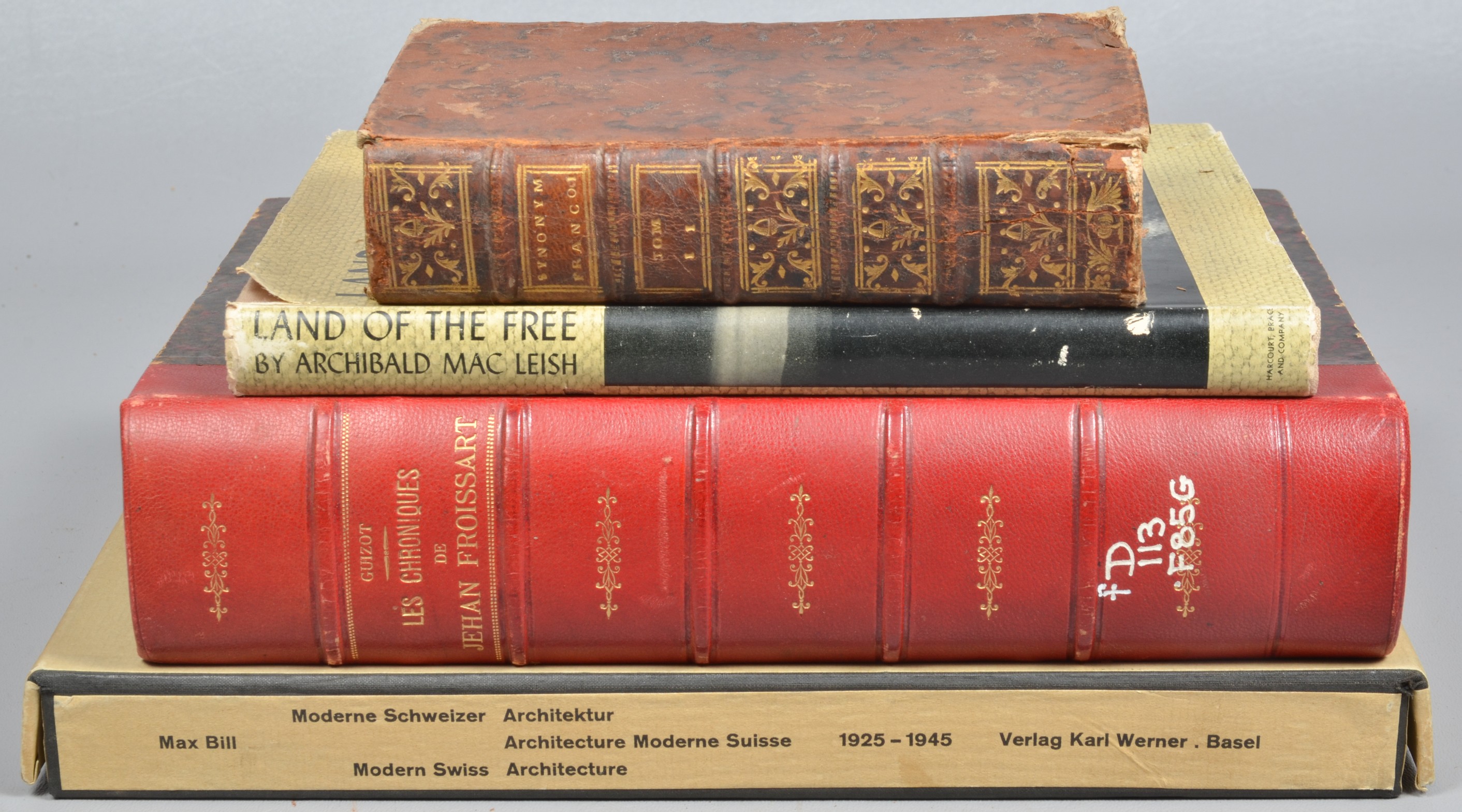 Four various collectible books,