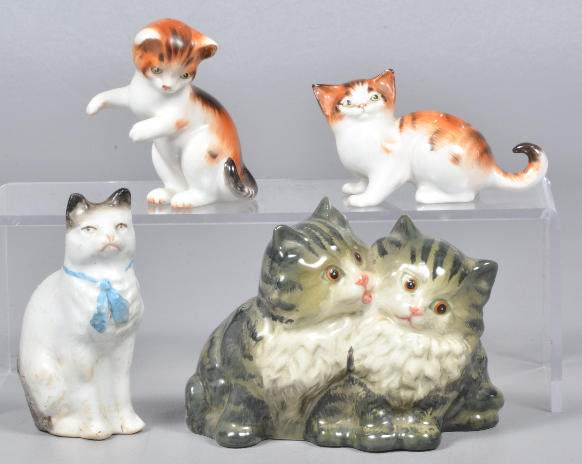  4 Porcelain cat figurines to 3b6aa6