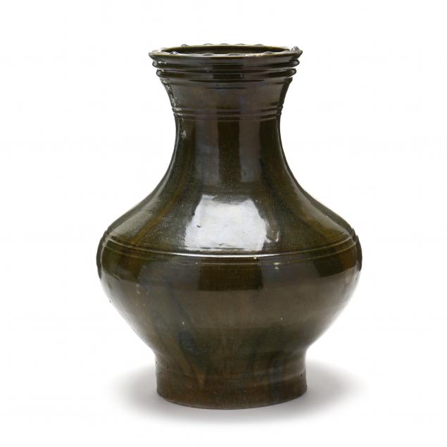 A LARGE CHINESE OLIVE GREEN GLAZED