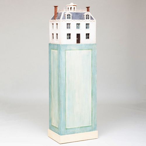 PAINTED WOOD MODEL OF A HOUSE ON