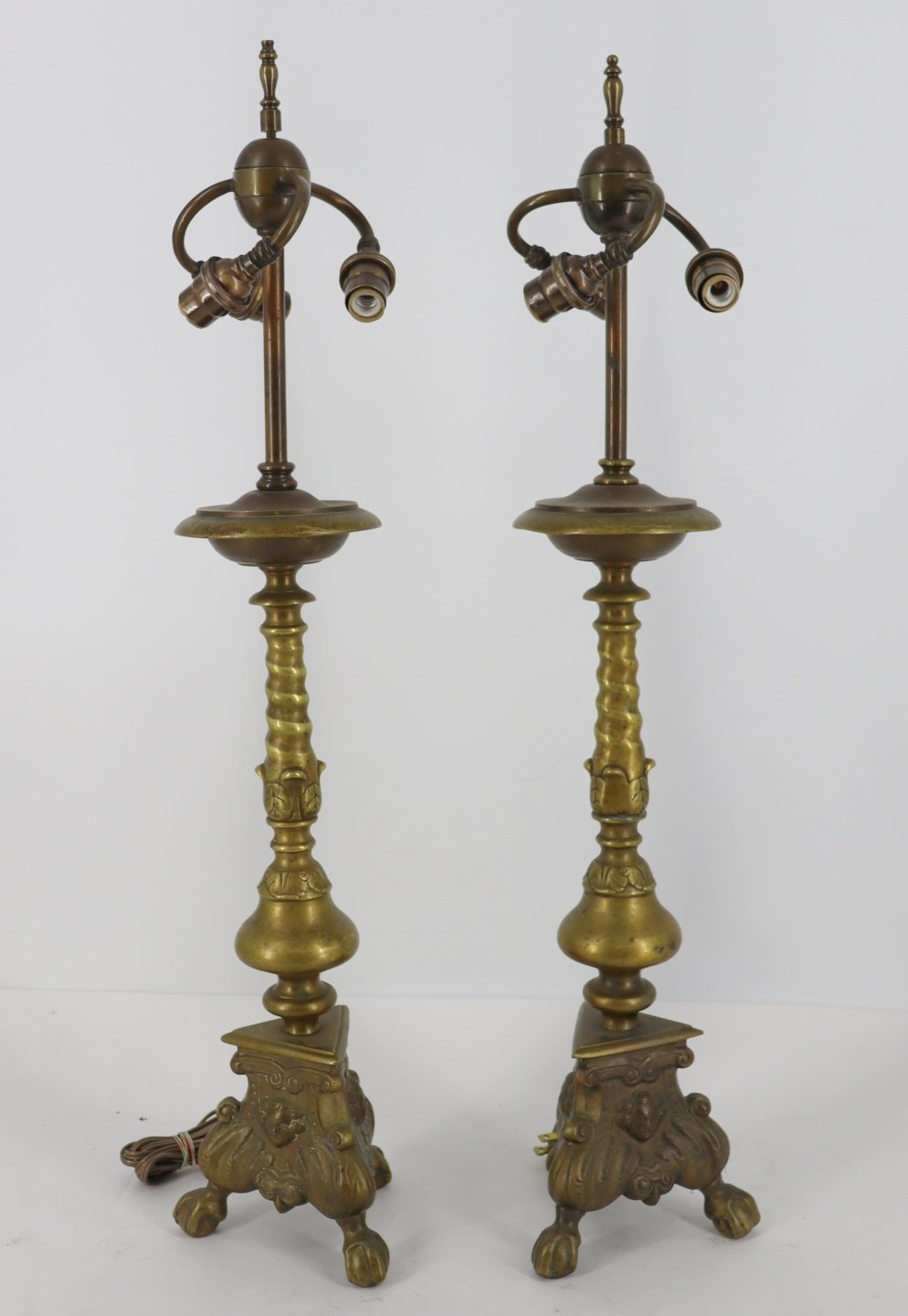 A PAIR OF ANTIQUE BRASS LAMPS. Good