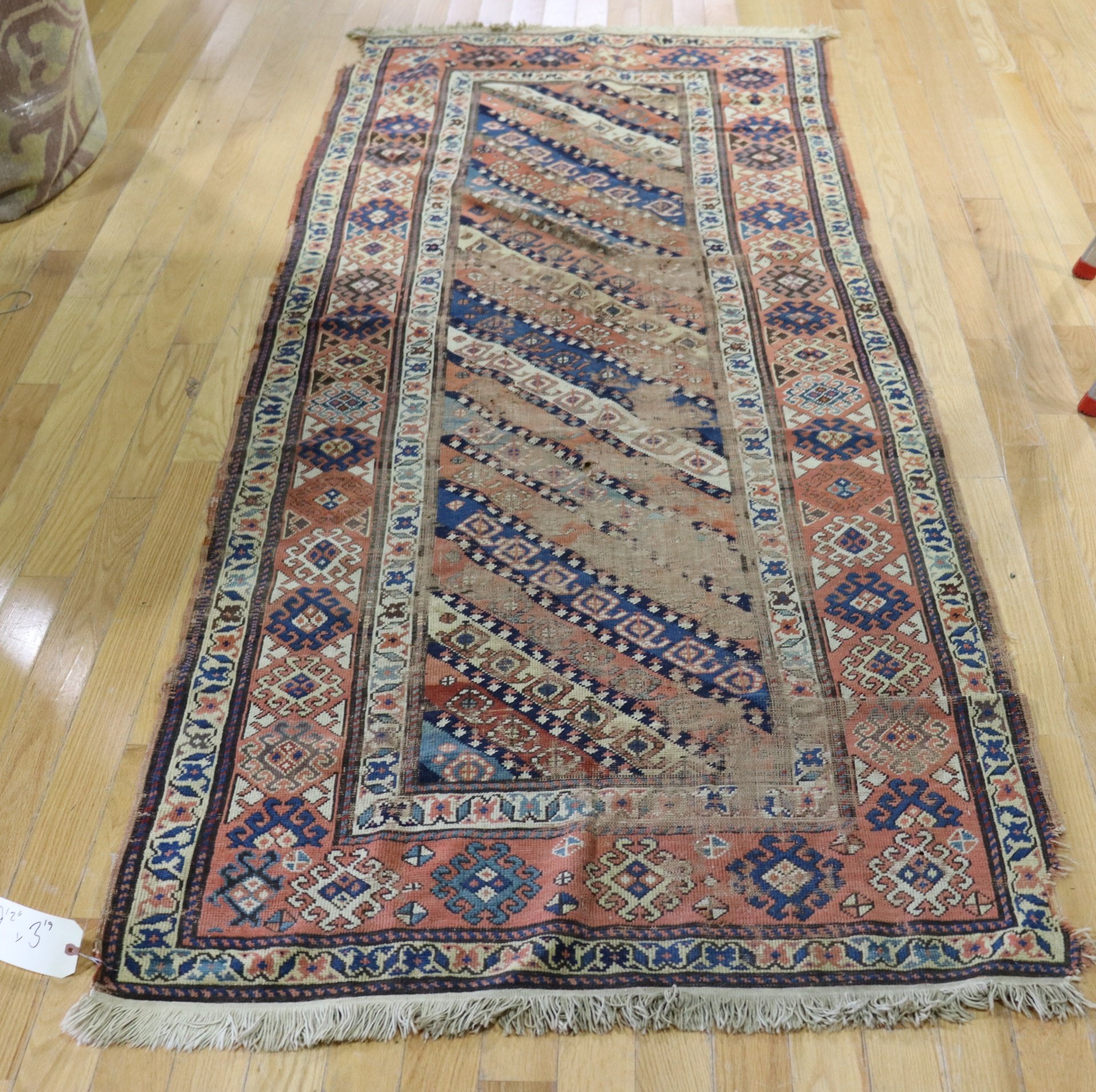 ANTIQUE AND FINELY HAND WOVEN RUNNER.