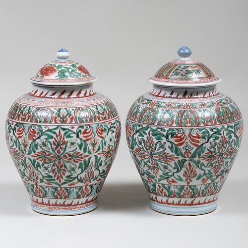 TWO ASIAN ENAMELED PORCELAIN JARS