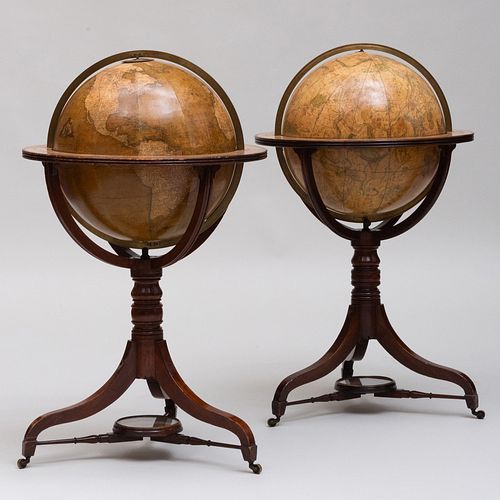 TWO FINE REGENCY GLOBES ON MAHOGANY