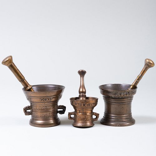 GROUP OF THREE BRONZE MORTARS AND