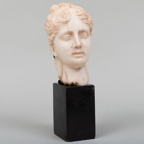 CARVED MARBLE BUST OF A MAIDEN,