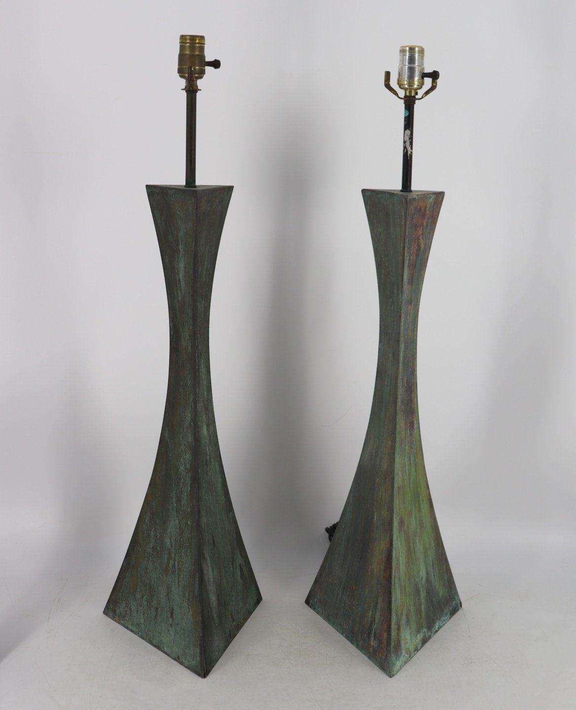 A PAIR OF PATINATED METAL GIACOMETTI