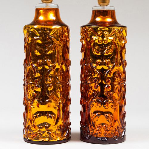 PAIR OF BITOSSI MOLDED AMBER GLASS