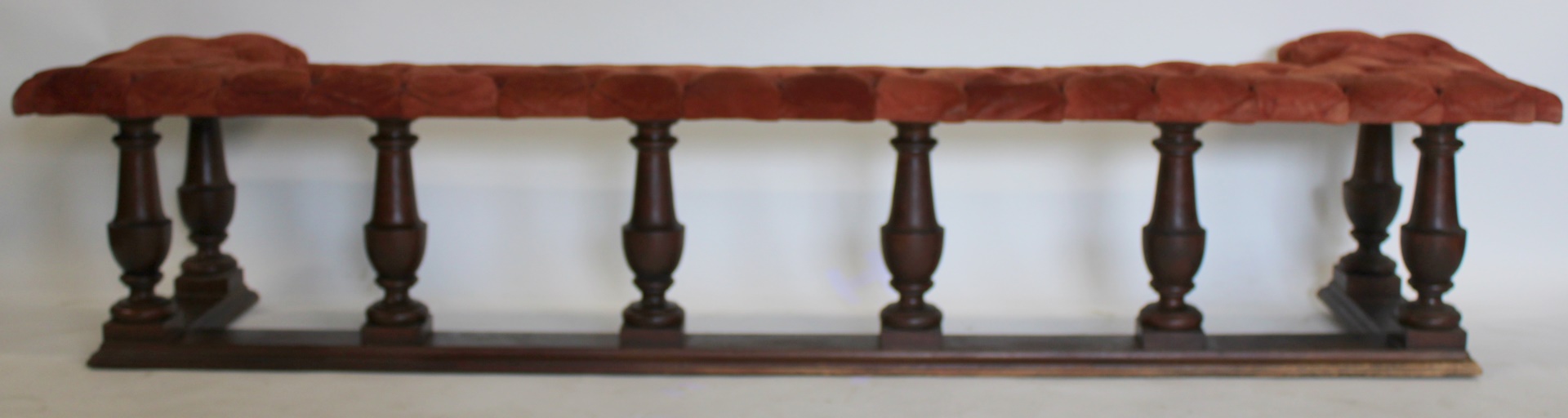 ANTIQUE UPHOLSTERED WOOD FIRE SURROUND.