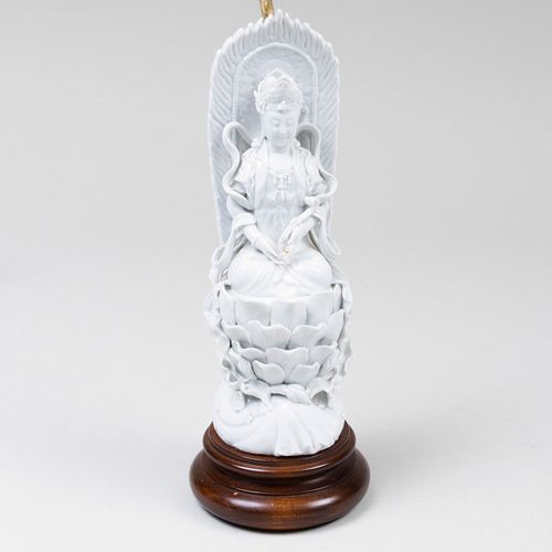 CHINESE WHITE GLAZED FIGURE OF