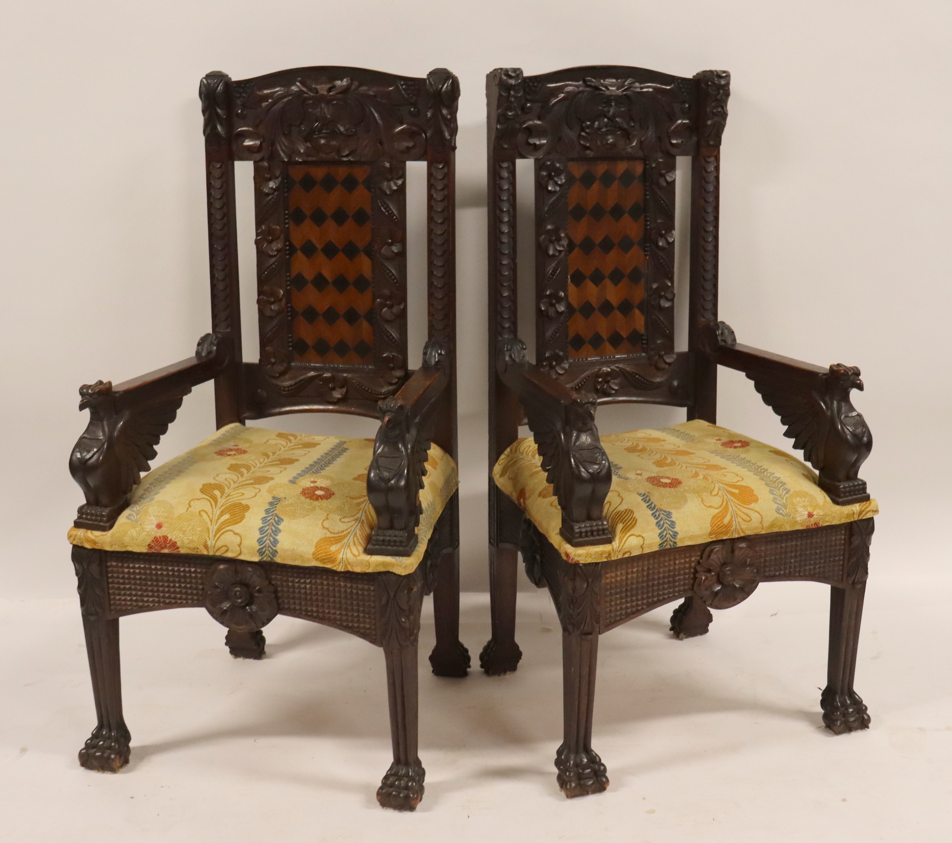AN ANTIQUE PAIR OF FINELY CARVED
