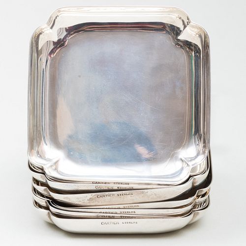 SET OF TEN CARTIER SILVER BUTTER