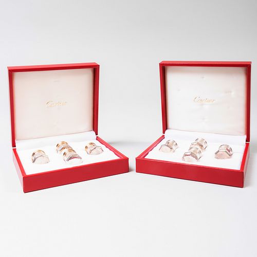 TWO SETS OF FOUR CARTIER SILVER 3b84d6