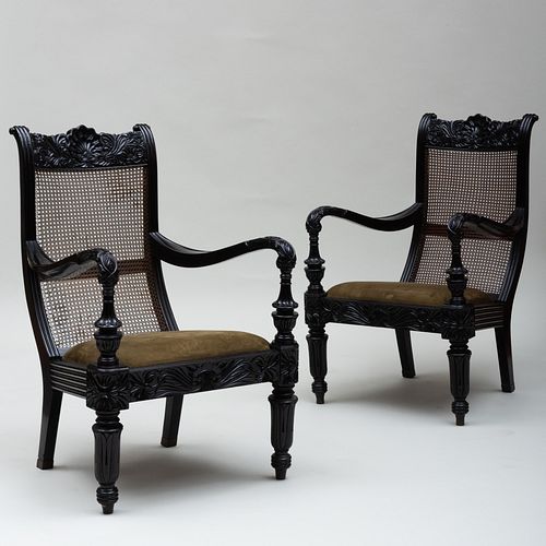 PAIR OF ANGLO-INDIAN CARVED EBONY