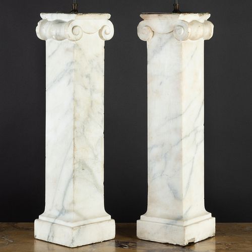 PAIR OF CARVED MARBLE IONIC COLUMNAR