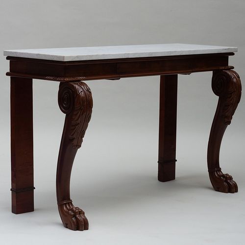 LATE REGENCY CARVED MAHOGANY CONSOLEFitted