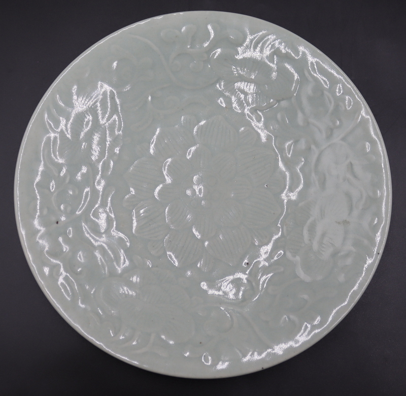 CHINESE CELADON INCISED FLORAL BOWL.