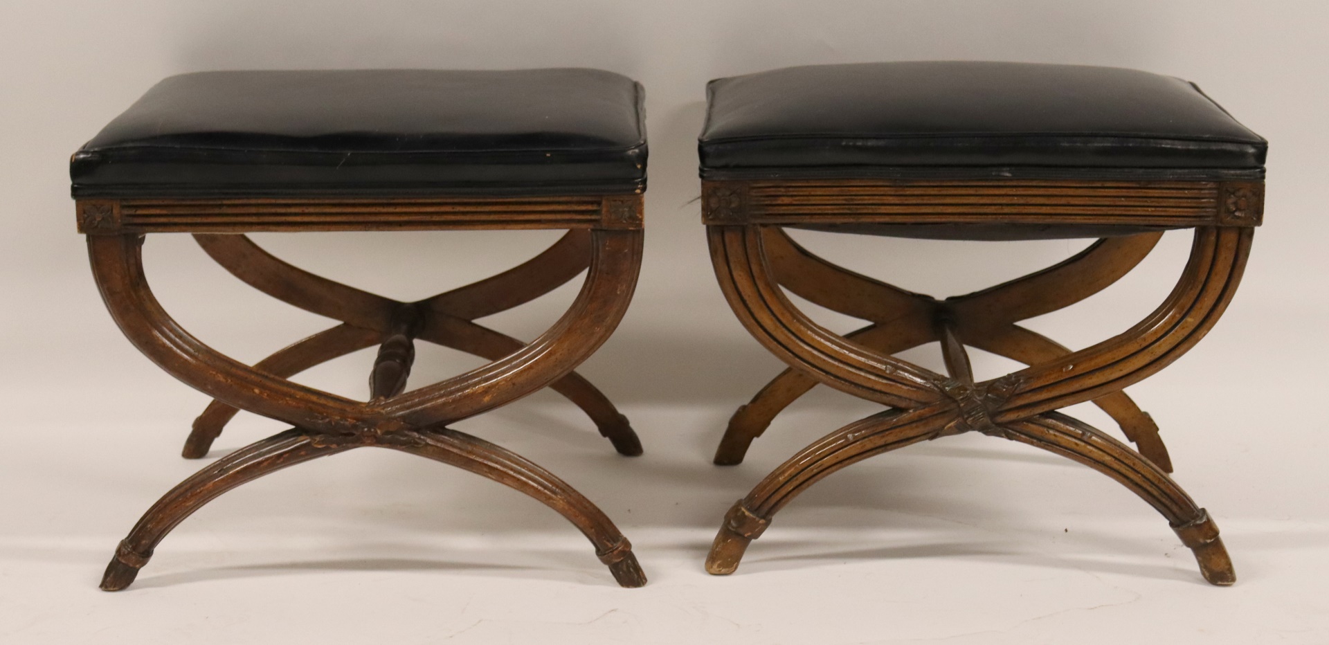 A VINTAGE PAIR OF UPHOLSTERED WOOD