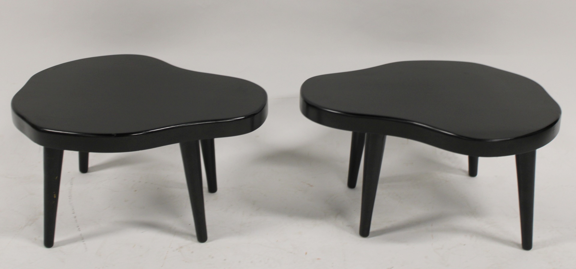 A PAIR OF MIDCENTURY STYLE EBONISED