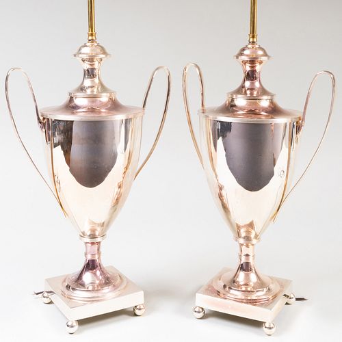 PAIR OF SILVER PLATE URNS MOUNTED 3b8b4e