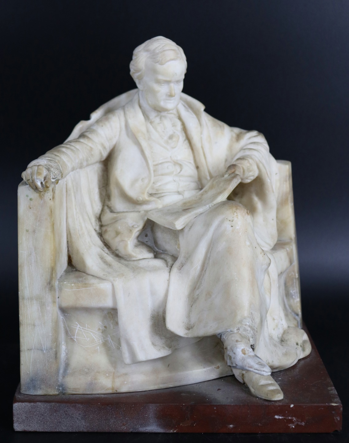 A MARBLE BUST OF A SEATED MAN  3b8c90